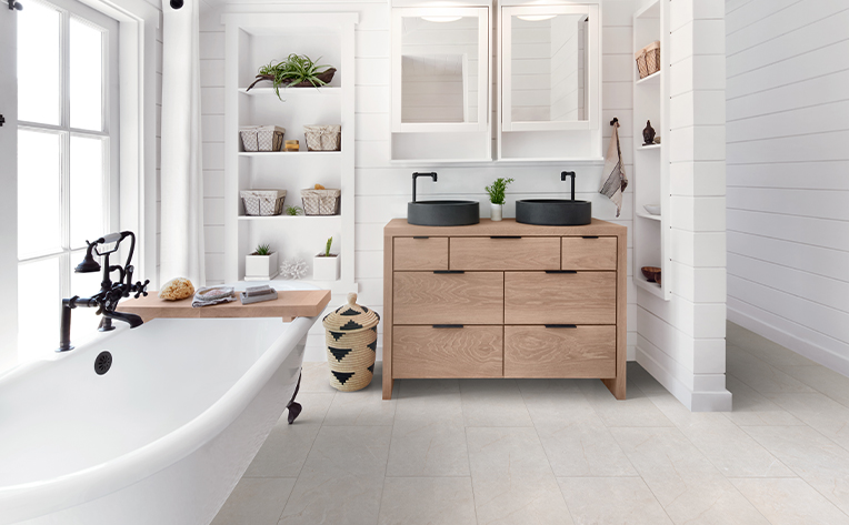 bathroom with light grey luxury vinyl floors